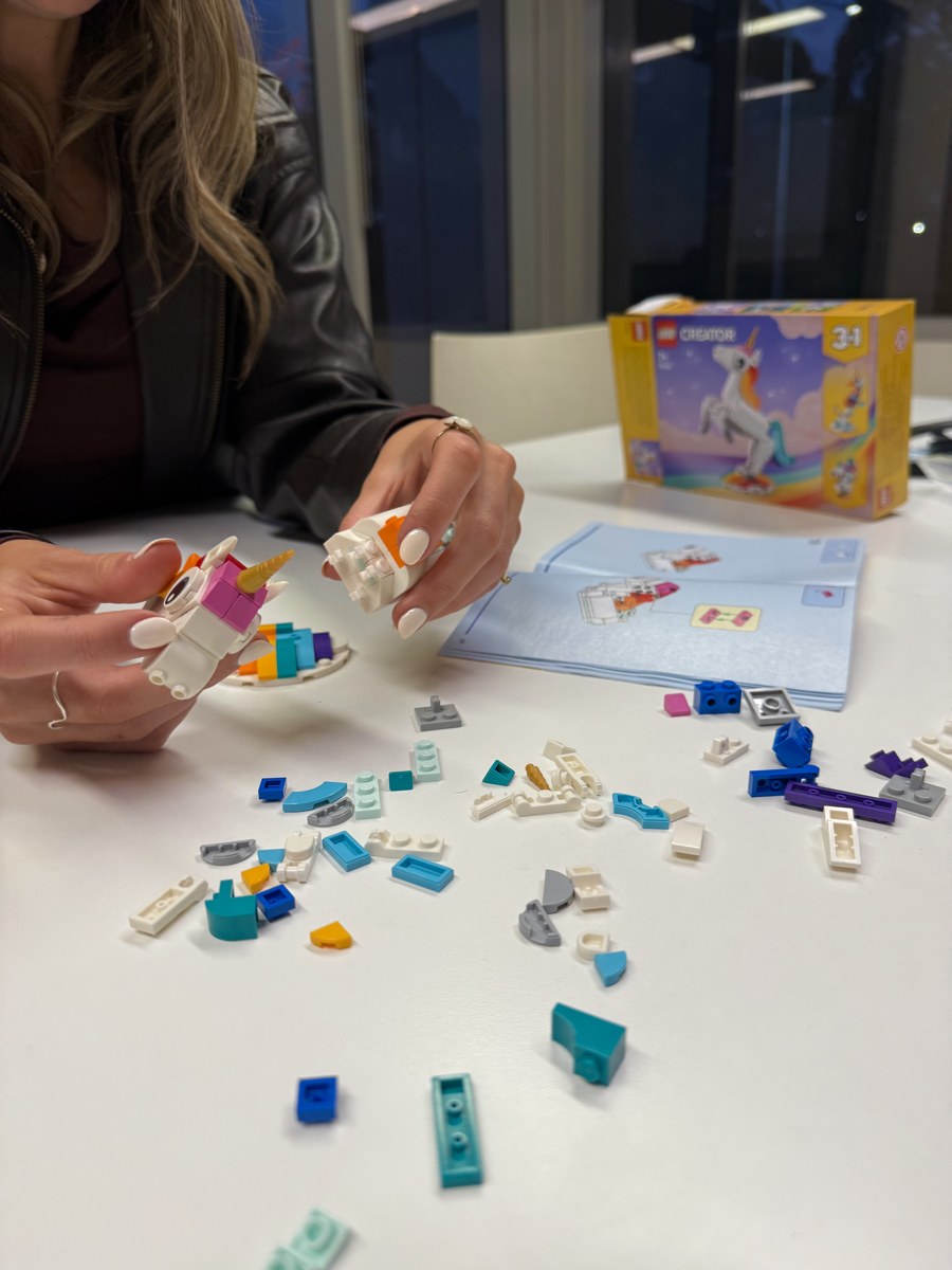 Building a LEGO set together at a table